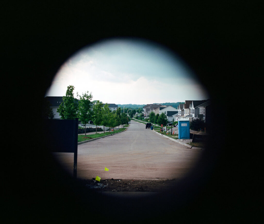 keyhole view of suburban street